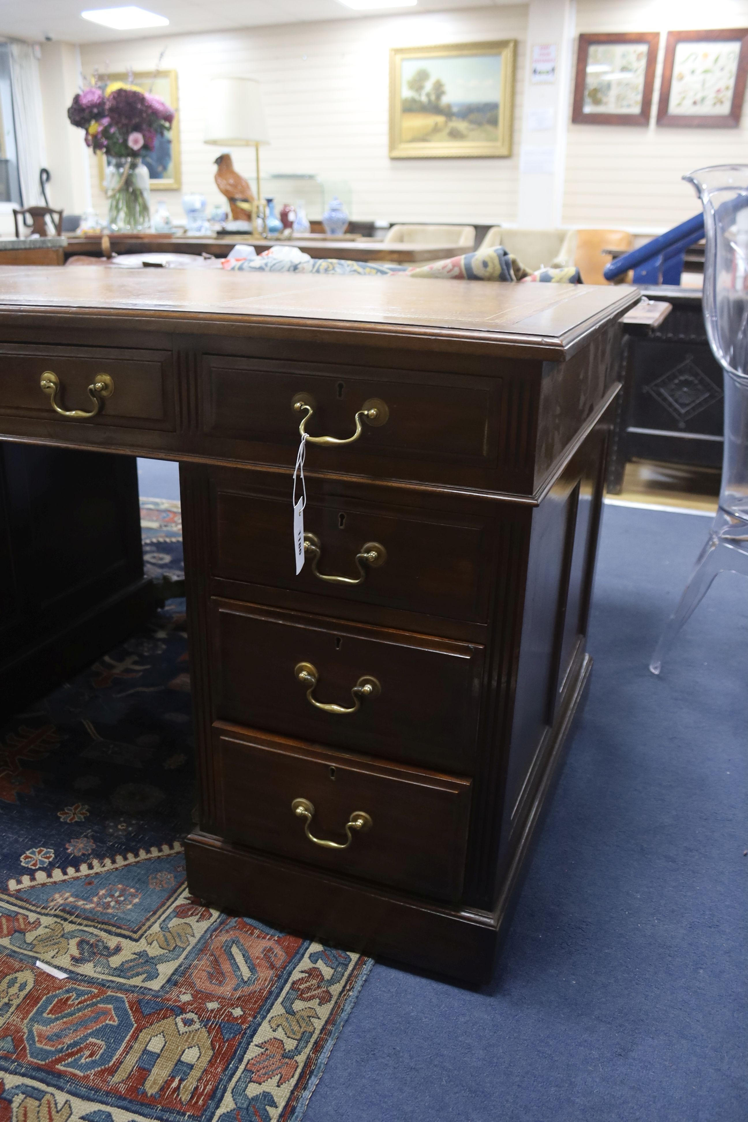 A late Victorian mahogany pedestal desk, length 138cm, depth 76cm, height 76cm